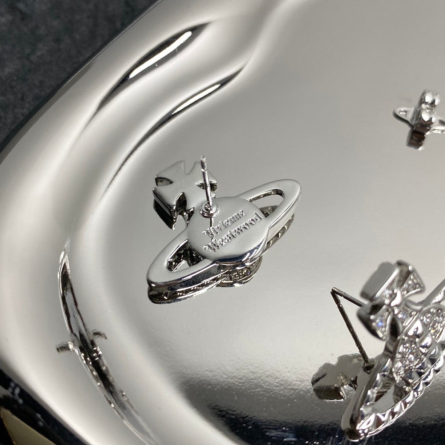 Vivienne Westwood Minimalist Planet & Cross Stud Earrings