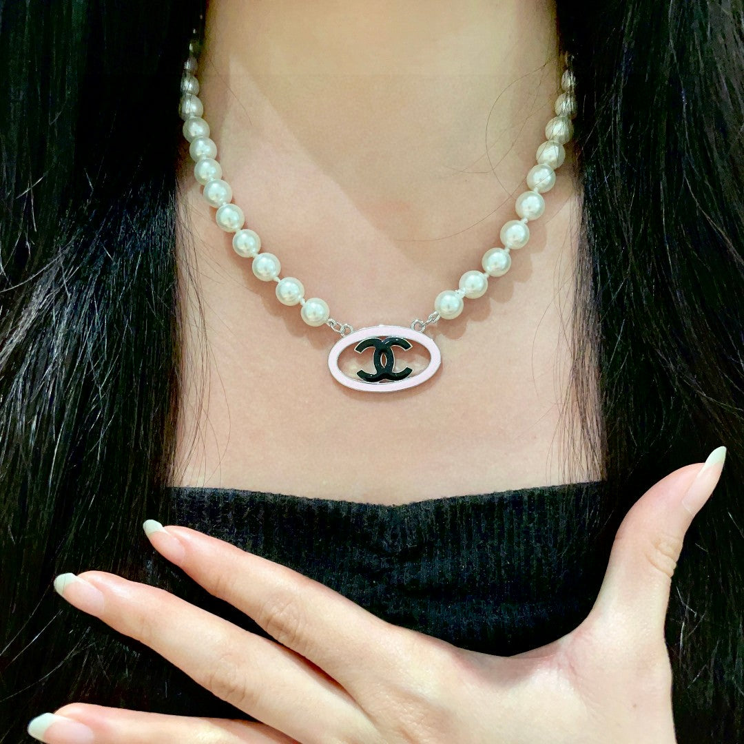 CHANEL P105 Pearl Double-C Necklace
