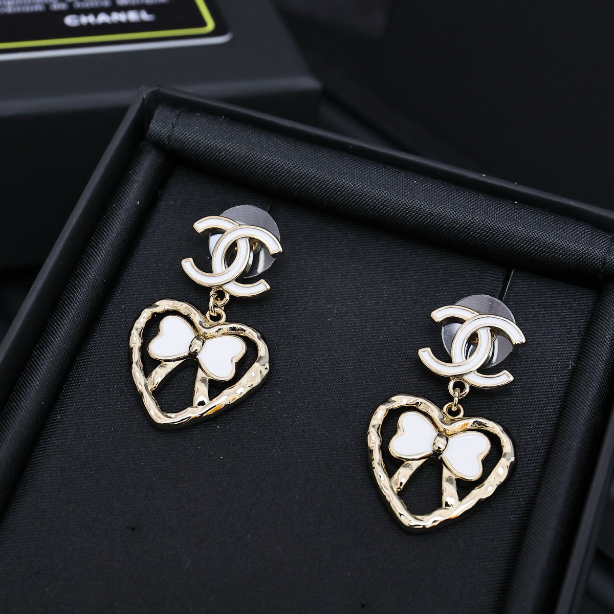 CHANEL Enamel Bow Earrings