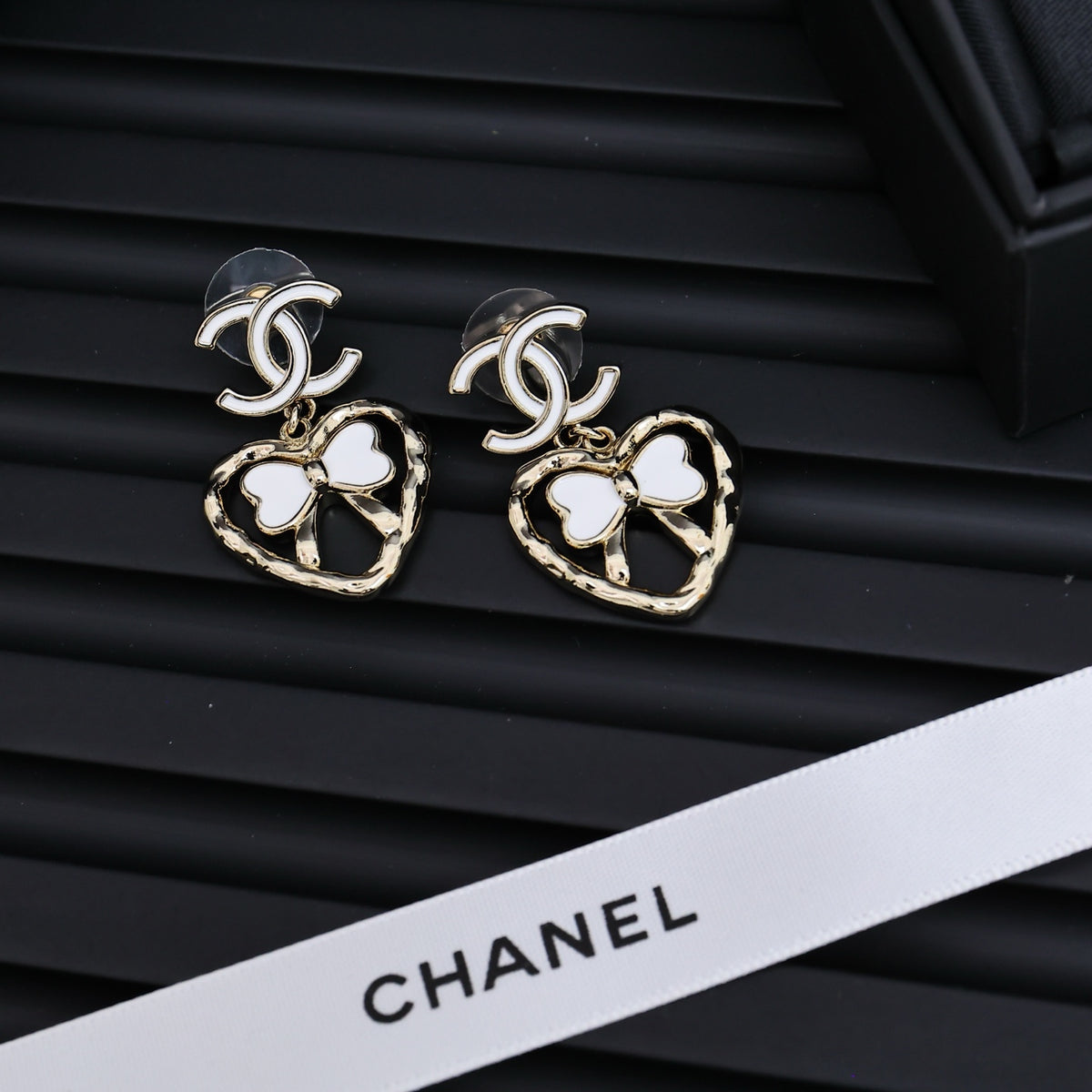 CHANEL Enamel Bow Earrings