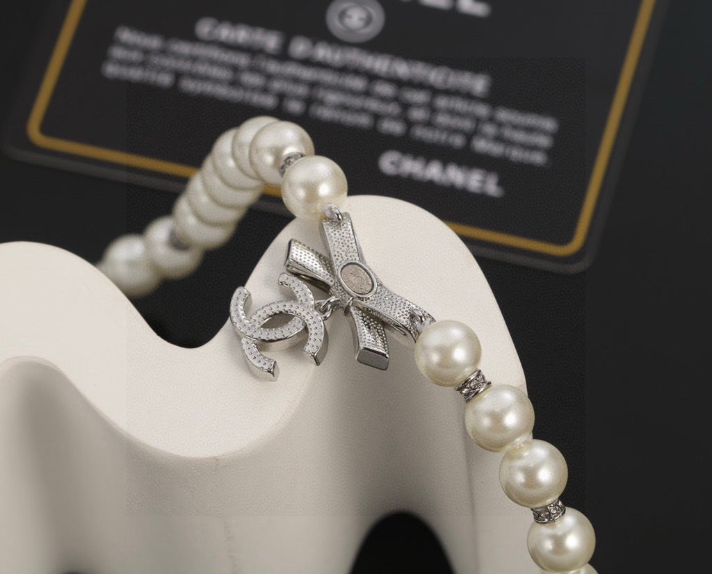 CHANEL Pearl Bow Choker Necklace