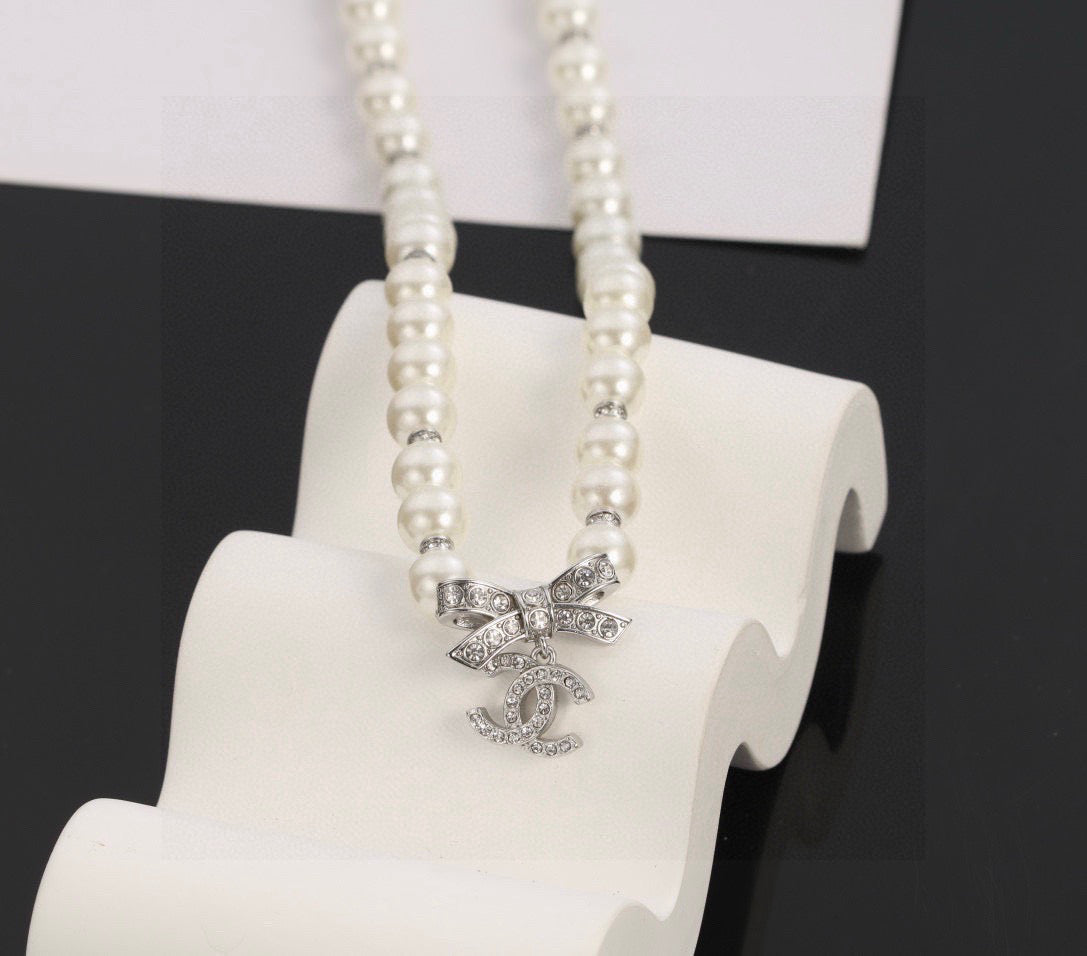 CHANEL Pearl Bow Choker Necklace