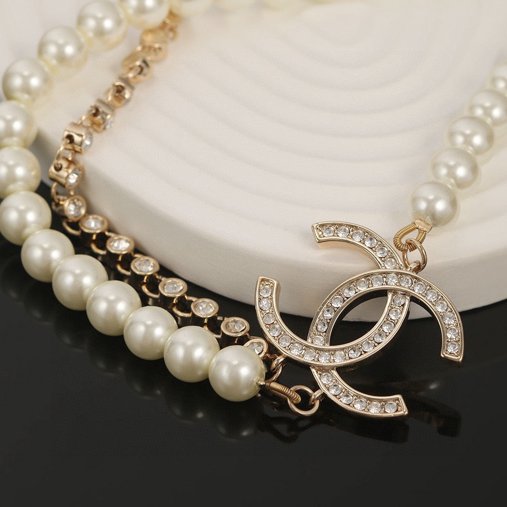 CHANEL Pearl Double-C Long Necklace