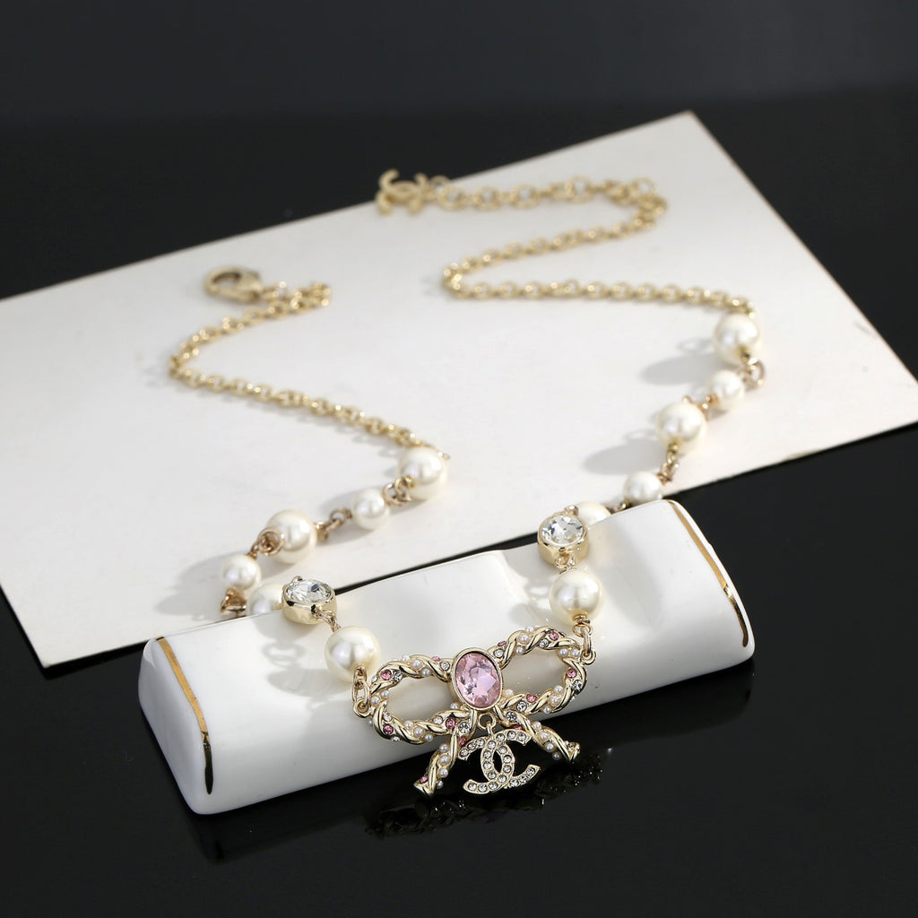 CHANEL Pearl Bow Long Necklace
