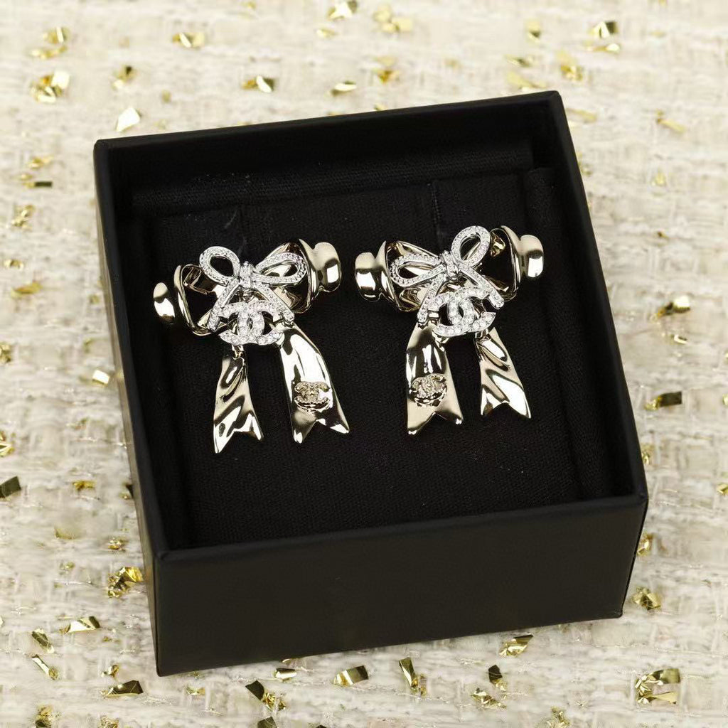 CHANEL Bow Earrings