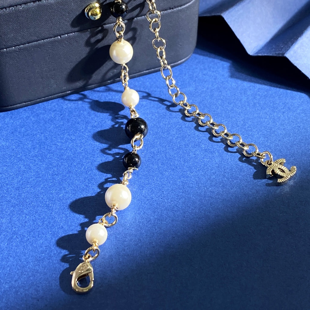 CHANEL P120 Pearl Double-C Camellia Long Necklace