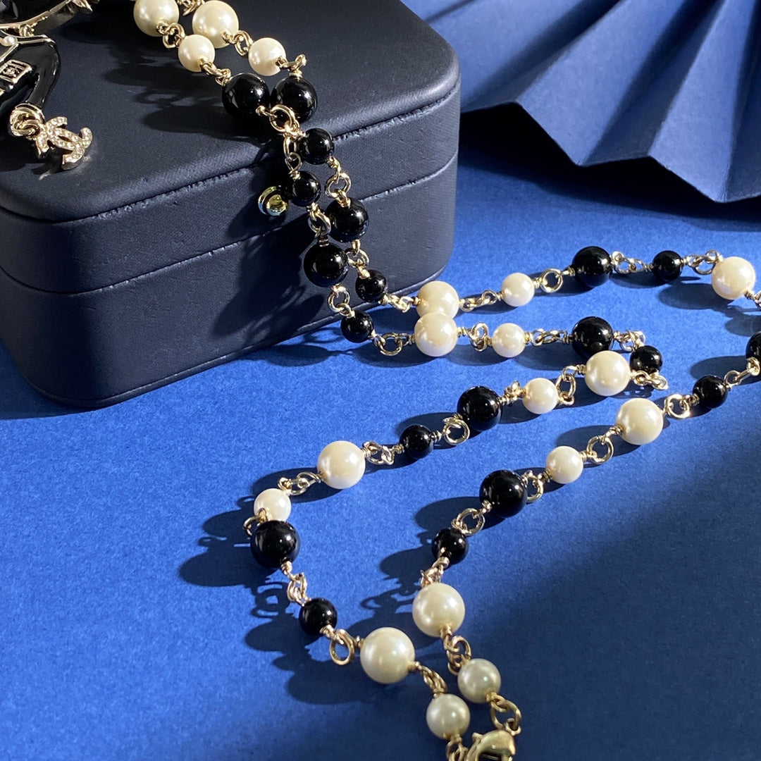 CHANEL P120 Pearl Double-C Camellia Long Necklace