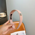 CHANEL Letter Logo Leather Metal Headband