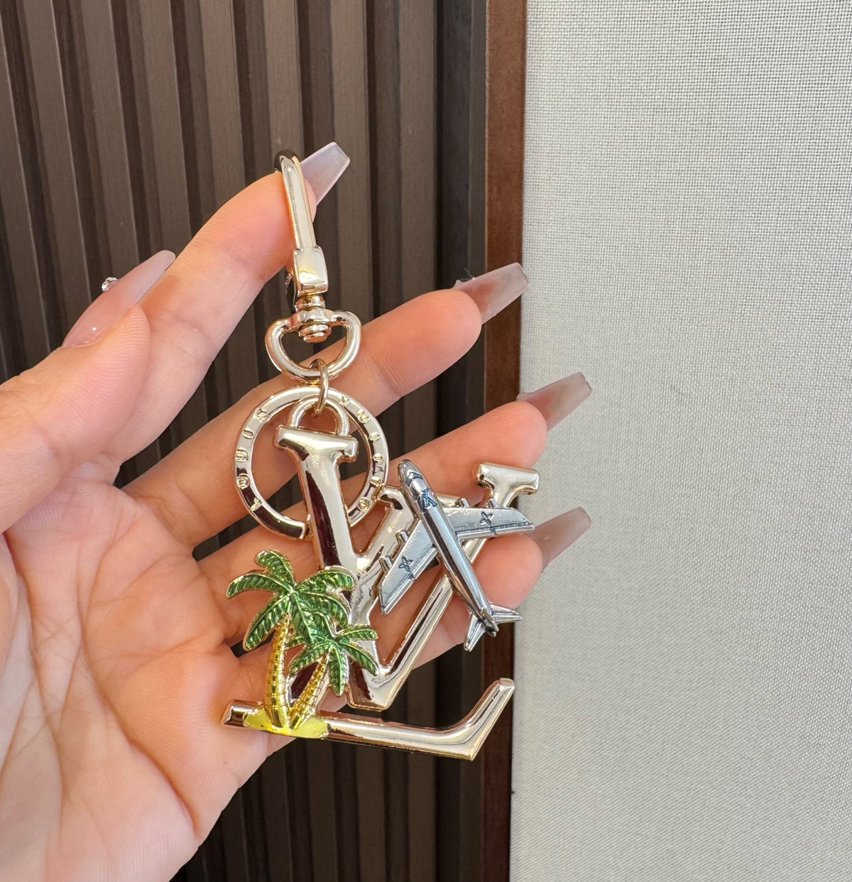 LOUIS VUITTON Metal Logo Bag Charm Keychain