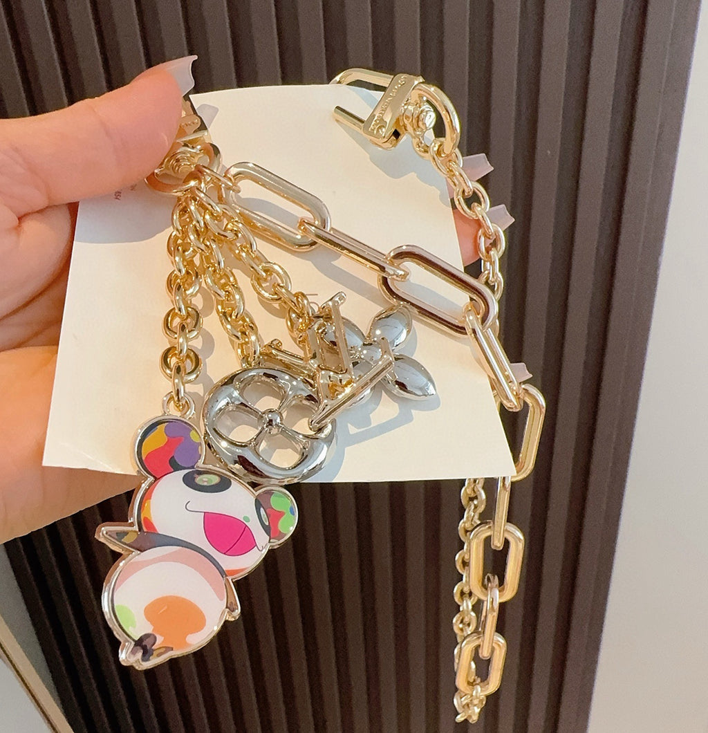 LOUIS VUITTON Canvas Metal Bag Charm Keychain