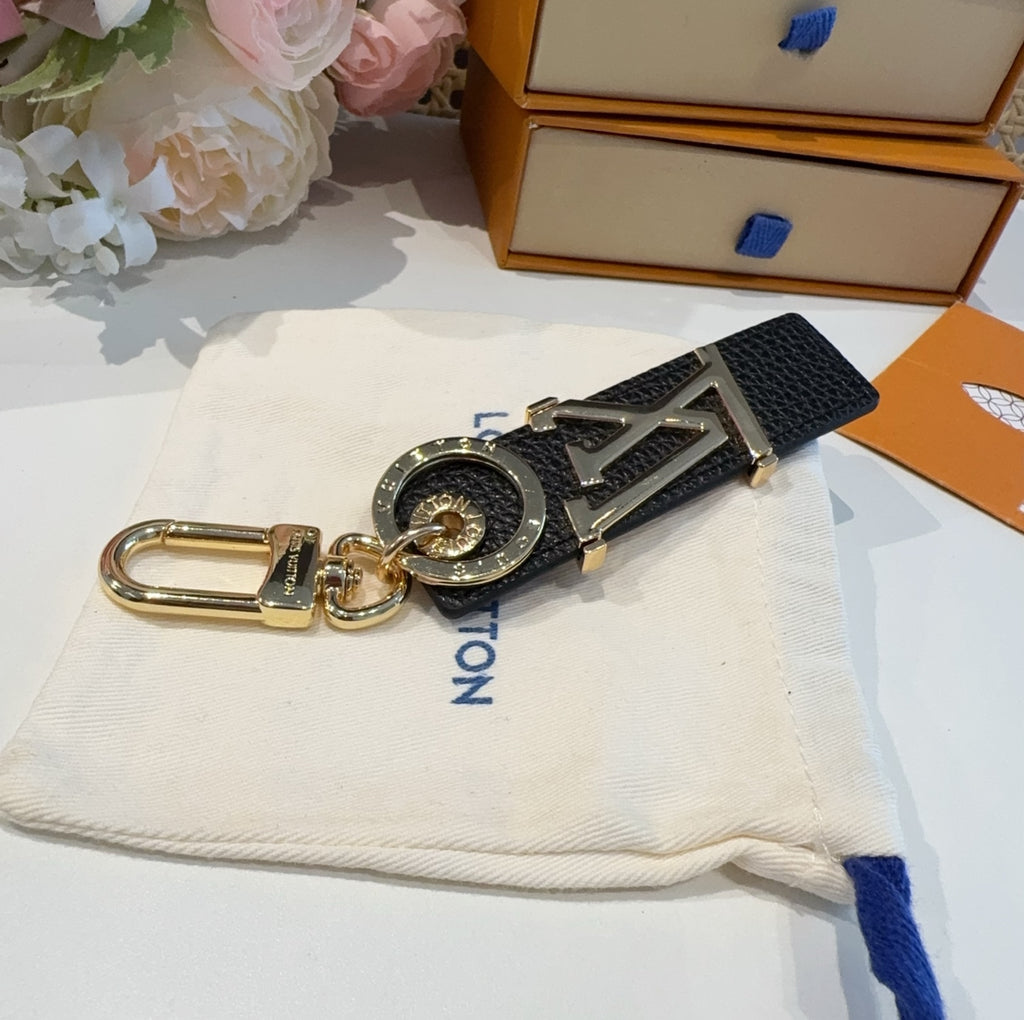 LOUIS VUITTON Leather Metal Bag Charm Keychain