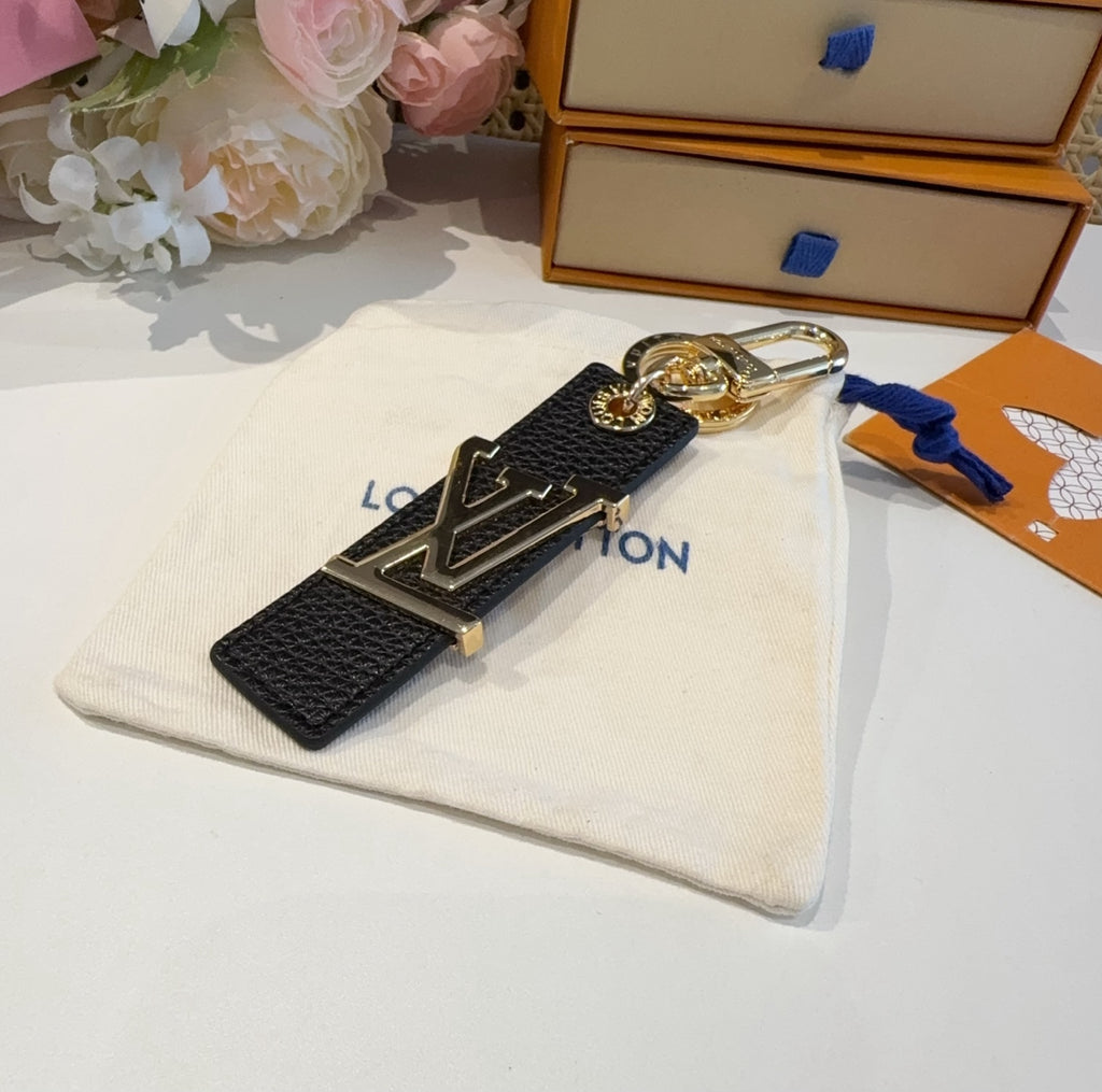 LOUIS VUITTON Leather Metal Bag Charm Keychain