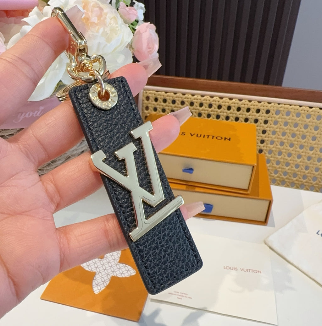 LOUIS VUITTON Leather Metal Bag Charm Keychain