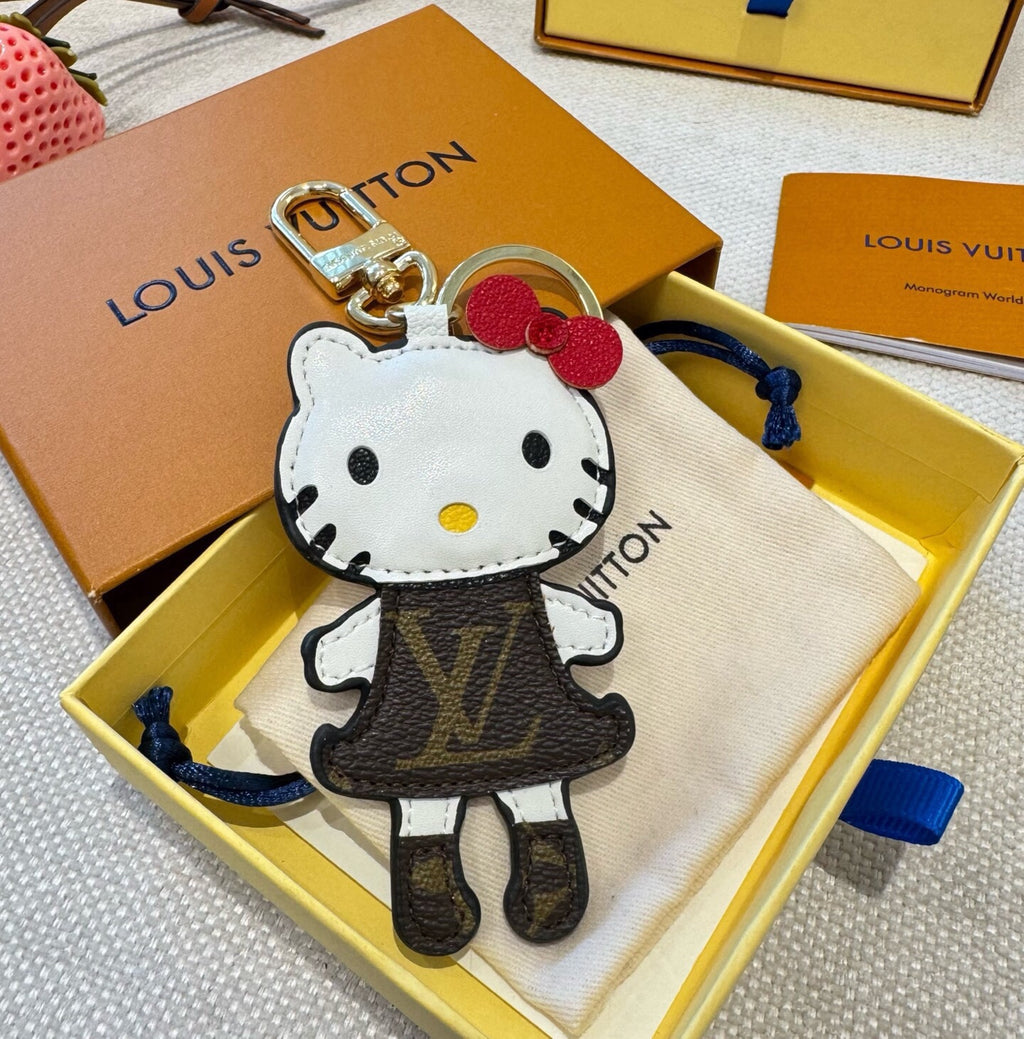 LOUIS VUITTON Metal Logo Bag Charm Keychain