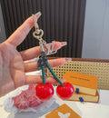LOUIS VUITTON M02476 Metal Logo Bag Charm Keychain