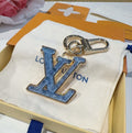 LOUIS VUITTON Metal Logo Bag Charm Keychain