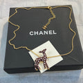 CHANEL Enamel Gold-Tone Vintage Deer Brooch
