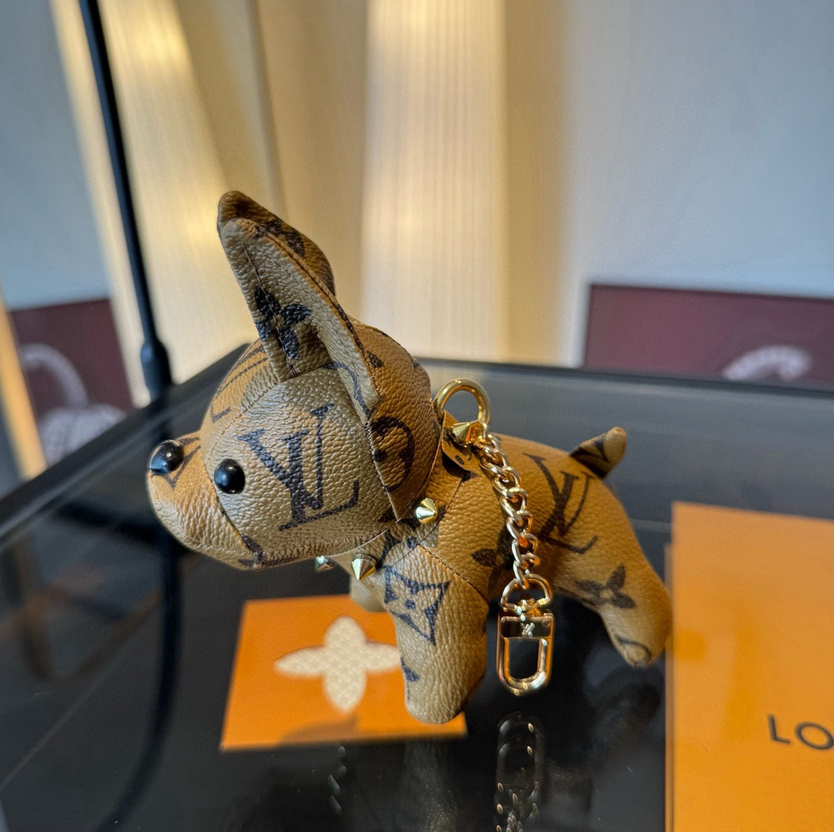 LOUIS VUITTON Metal Logo Keychain