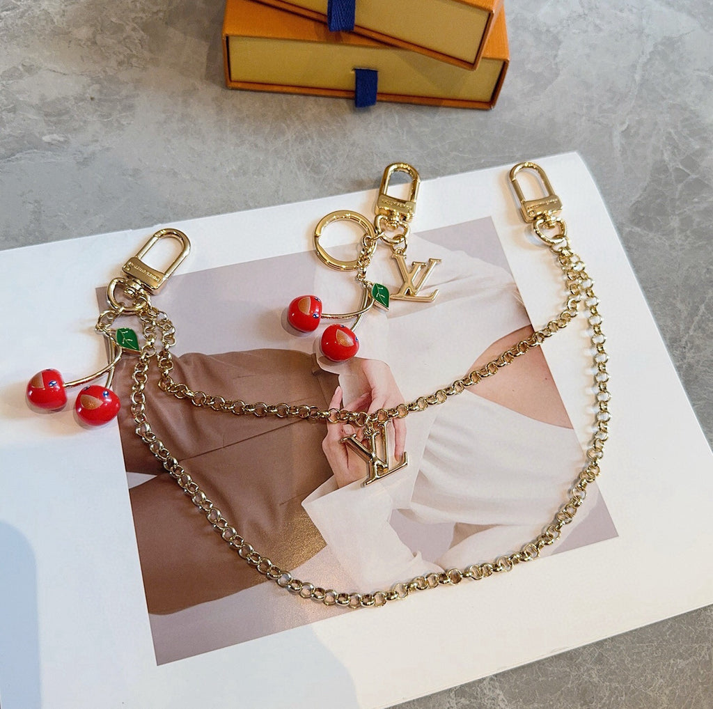 LOUIS VUITTON Metal Logo Bag Charm Keychain