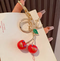 LOUIS VUITTON Metal Logo Bag Charm Keychain