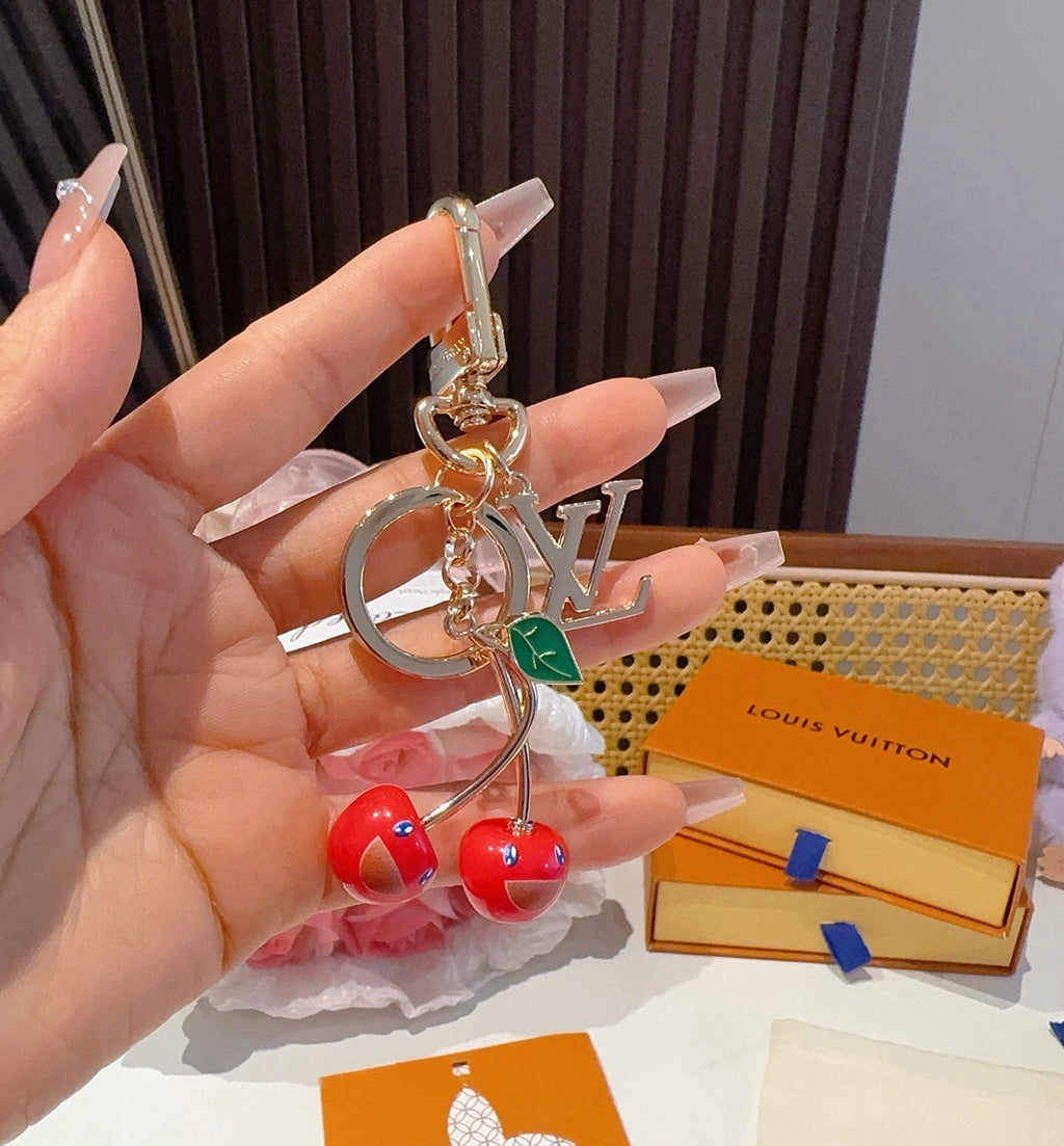 LOUIS VUITTON Metal Logo Bag Charm Keychain