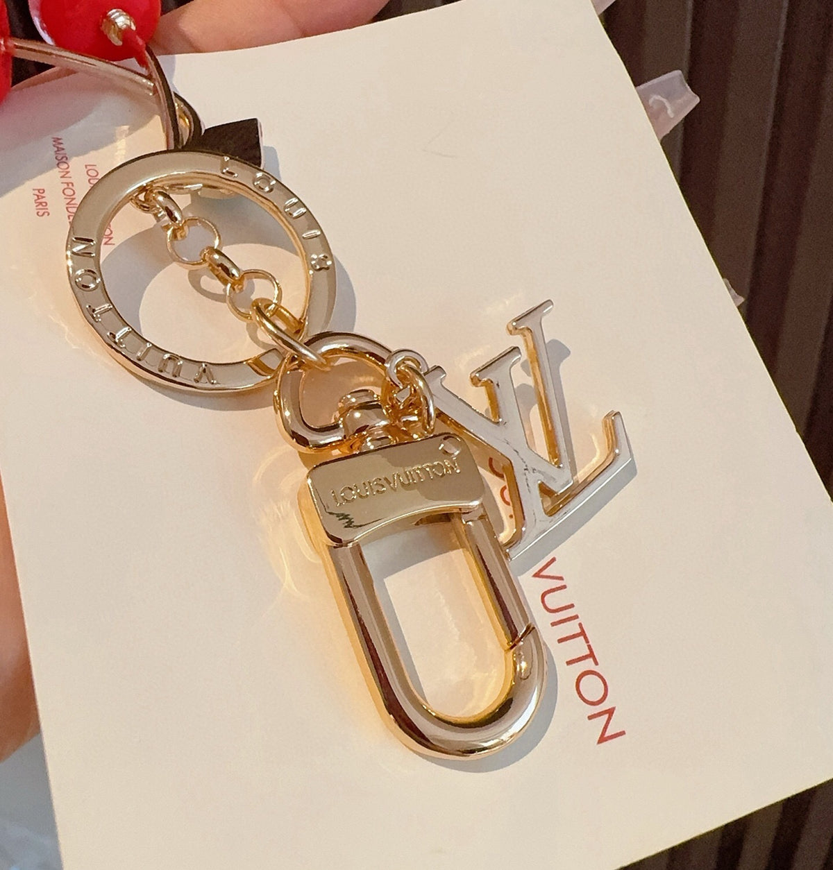 LOUIS VUITTON Metal Logo Bag Charm Keychain