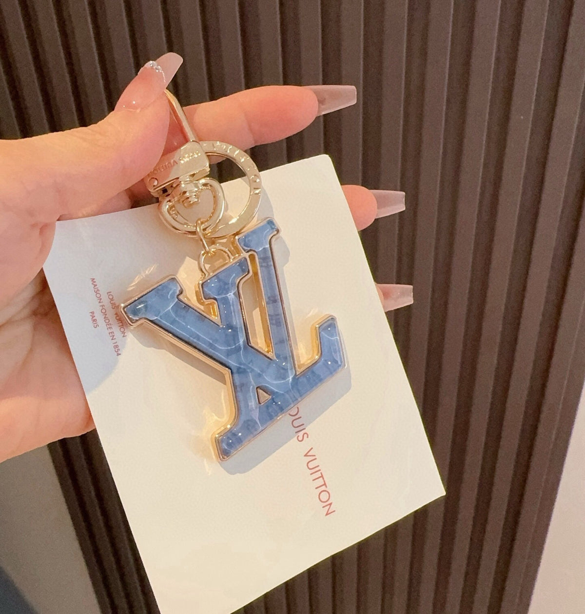 LOUIS VUITTON Metal Logo Bag Charm Keychain