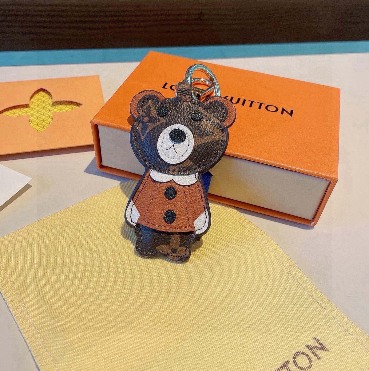 LOUIS VUITTON Metal Logo Bag Charm Keychain