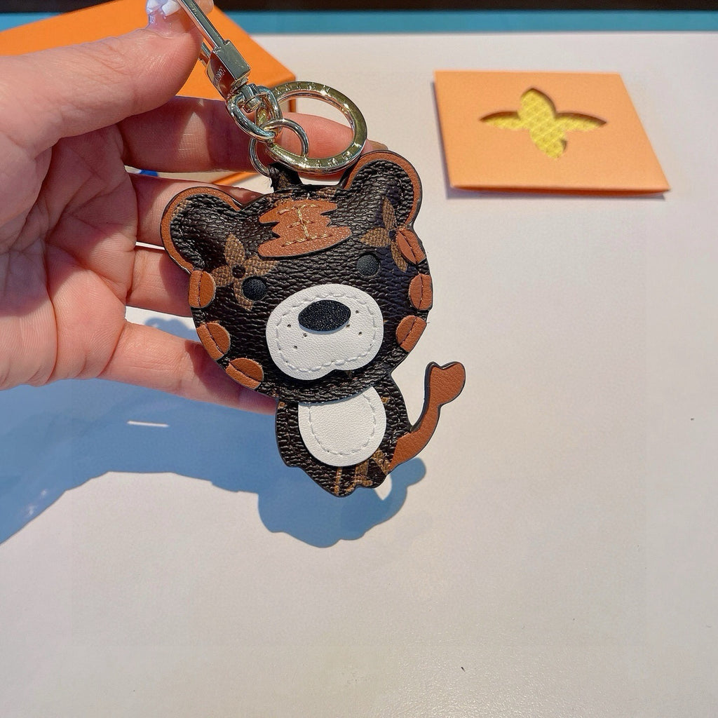 LOUIS VUITTON Metal Logo Bag Charm Keychain