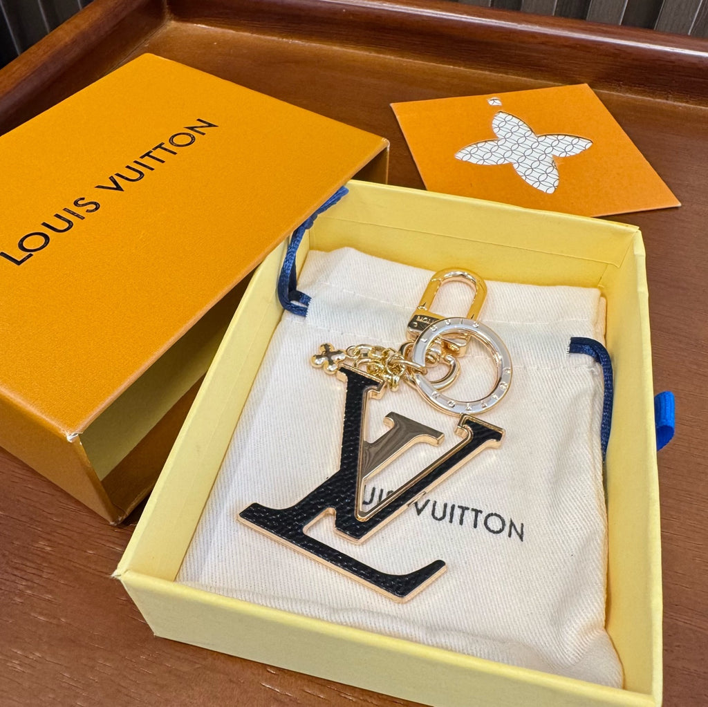 LOUIS VUITTON Brass Flower Bag Charm Keychain