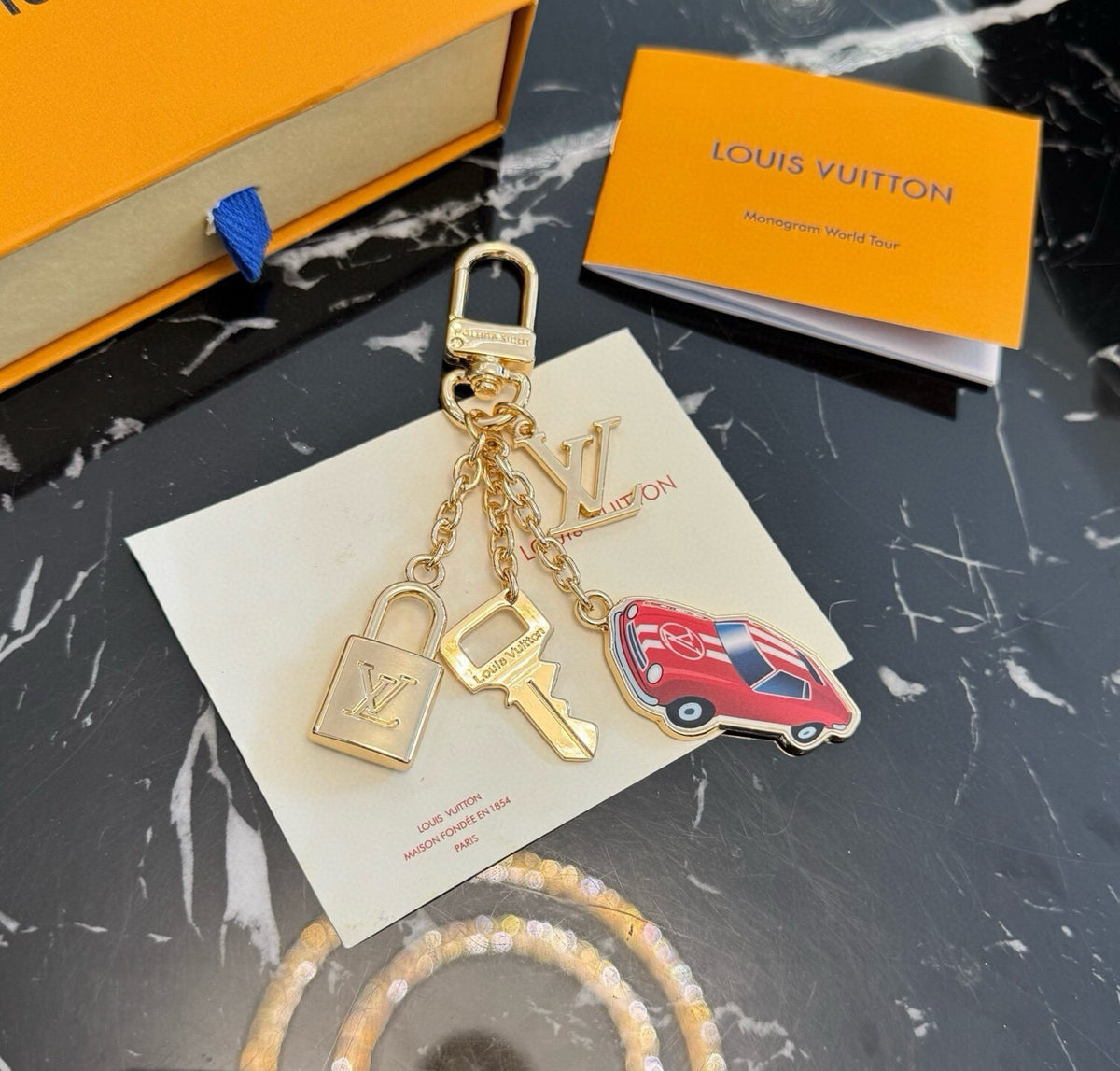 LOUIS VUITTON Logo Keychain